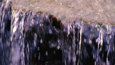 Small waterfall in the forest Stock-Footage 147648235