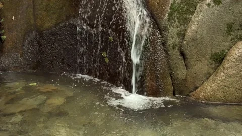 A small waterfall in the forest Stock Footage 160341047