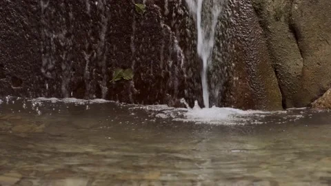 A small waterfall in the forest Stock-Footage 160341083