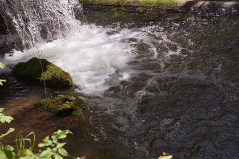 Small waterfall in the forest Stock Photos