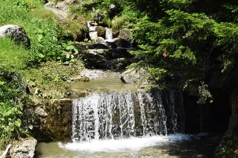 A small waterfall in the forest Stock Photos