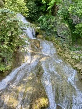 Small waterfall in the forest Stock Photos