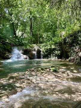 Small waterfall in the forest Stock Photos