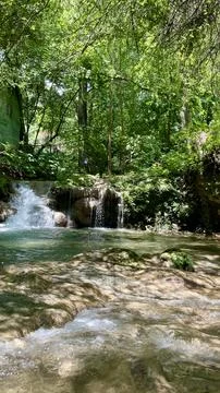 Small waterfall in the forest Stock Photos