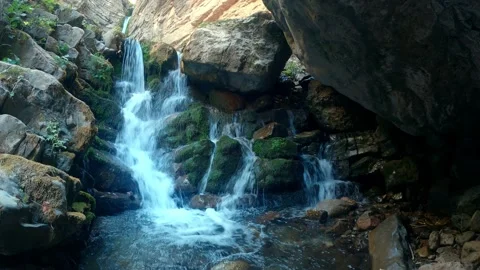 A small waterfall in front of Kulasya waterfall in Tashkent region Stock Footage 171559498