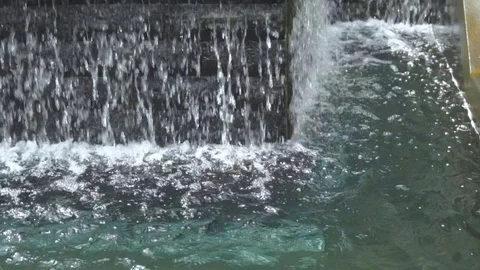 Small waterfall in garden decorative Stock Footage 117355086