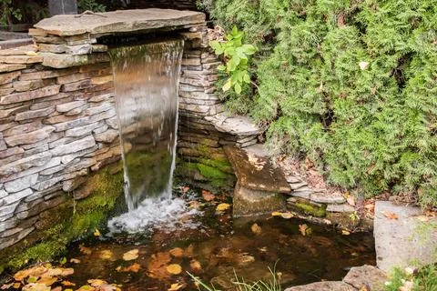 Small waterfall in garden Stock Photos