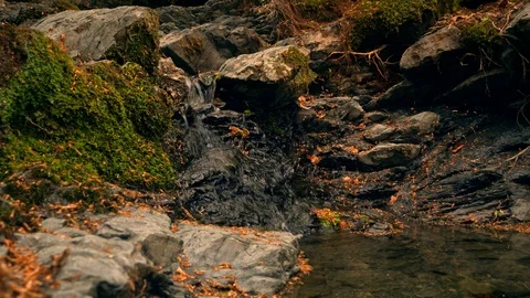 Small Waterfall Gently Flowing (4k) Stock Footage 108143616
