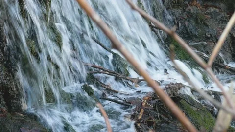 Small waterfall by a lake 库存影片 149842283