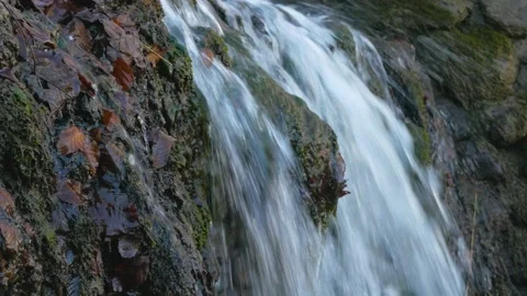 Small waterfall by a lake 库存影片 149842306