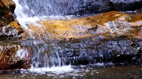 Small Waterfall Meets Pond Stock Footage 74643806