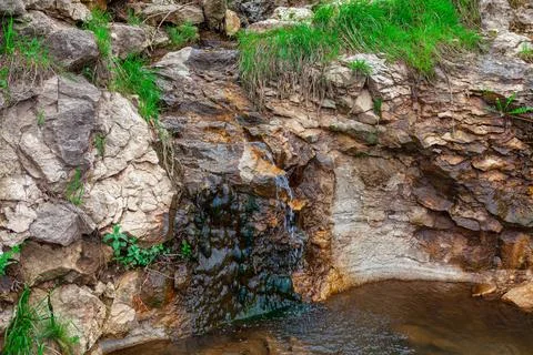 Small waterfall in the mountain Stock Photos