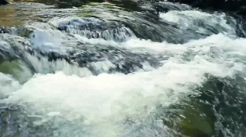 Small waterfall on a mountain river Stock Footage 52004014