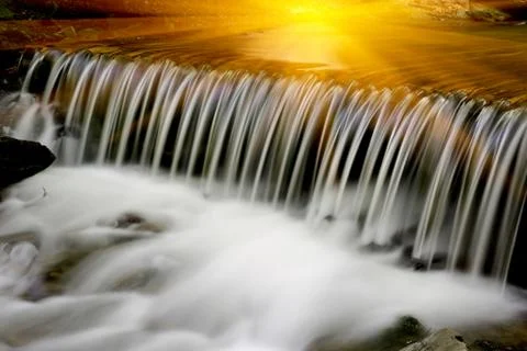 Small waterfall on mountain river Fotos de archivo