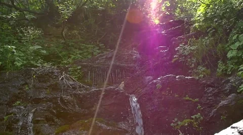 Small waterfall in mountains Stock Footage 53101262