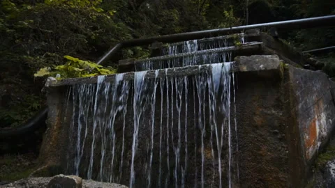 A small waterfall in the mountains Stock Footage 95039886
