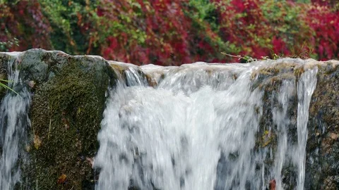 Small waterfall in the mountains Stock Footage 97980875