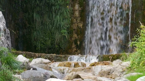 Small waterfall in the mountains Stock Footage 98183820