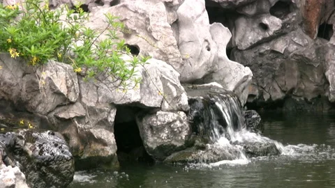 A small waterfall in the mountains 動画素材 106452790