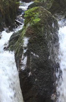 Small waterfall in the mountains Stock Photos