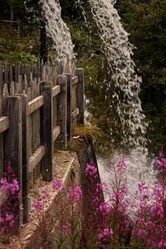 A small waterfall in the mountains. Stock Photos