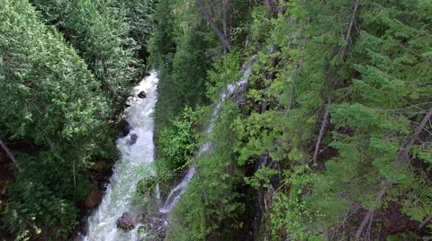 Small Waterfall next to river Video stock 63376136