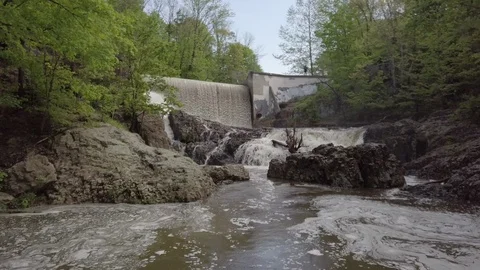 Small waterfall over a dam in central New Jersey Stock Footage 126243232