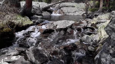 Small waterfall over rocks Stock Footage 155983934