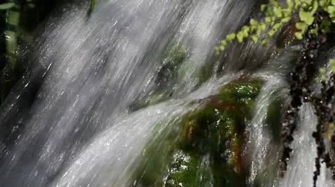 A small waterfall in a park Stock Footage