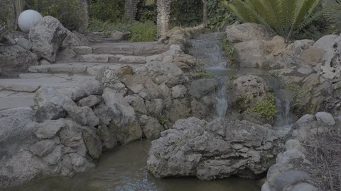 A small waterfall in the park. Stockbeeldmateriaal 98356685