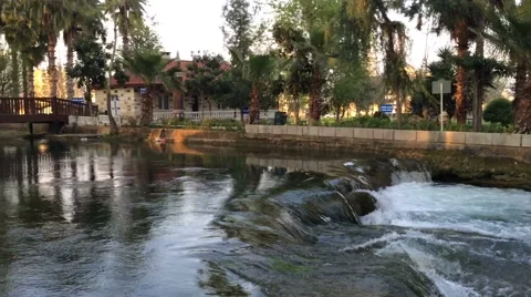  Small waterfall in the park at sunset day in Stock Footage 61750227