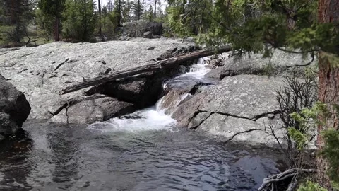 Small waterfall into pond Stock Footage 155983952