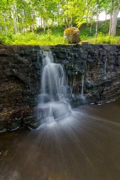 A small waterfall at Renda in the middle of summer. Stock Photos