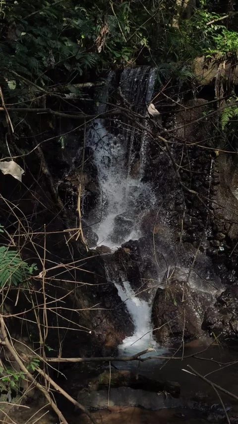 Small waterfall at a river Video stock 284599979