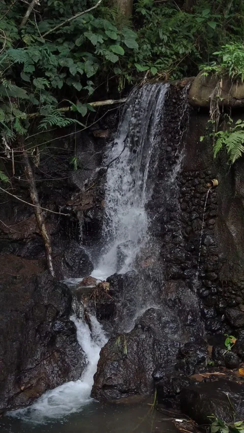Small waterfall at a river Stock Footage 284600144
