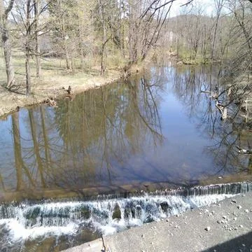 Small waterfall in the river Stock Photos