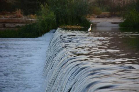 Small waterfall in a river Stock Photos