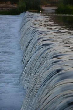 Small waterfall in a river Stock Photos