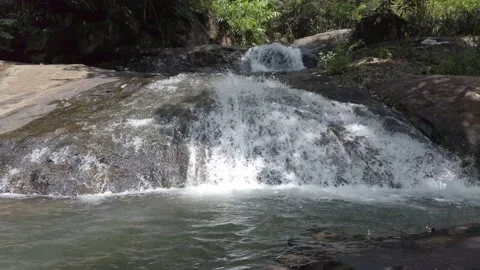 Small waterfall from a rock mountain Stock Footage 156225171