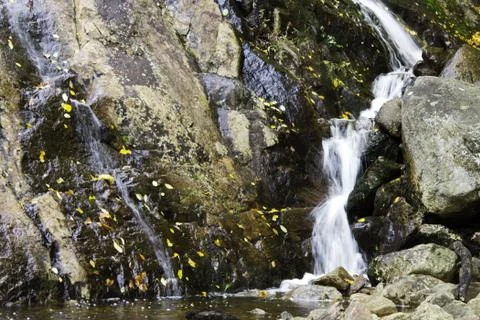 Small waterfall in the rocks Stock Photos