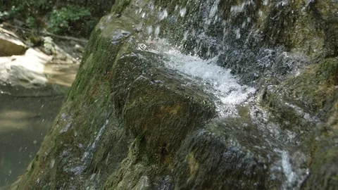 Small Waterfall. Slowmotion Stock Footage 101435612