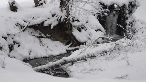 Small Waterfall in Snow Covered Forest Video stock 315897132