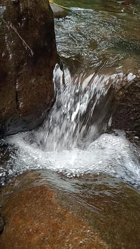 Small Waterfall Stream Flowing Over Brown Rocks Nature Scene Stock Footage 330531098