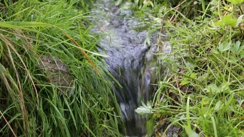 Small waterfall on a stream Stock Footage 160760534