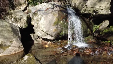 A small waterfall on the stream. Stock Footage 326924770