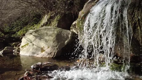 A small waterfall on the stream. Stock Footage 326924801