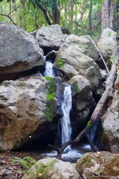 Small waterfall in stream Stock Photos