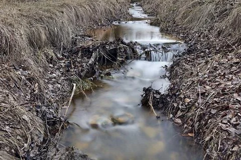 Small waterfall in a stream Stock Photos