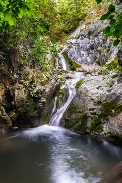 Small waterfall in the summer Stock Photos