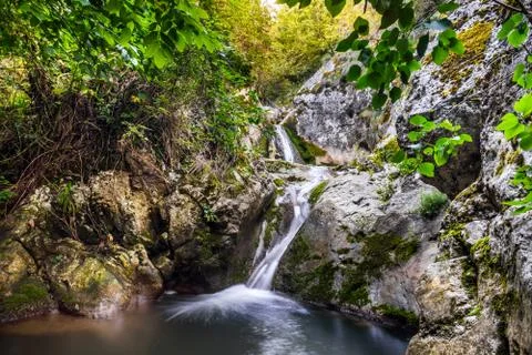 Small waterfall in the summer 스톡 사진